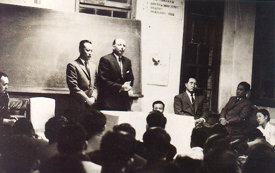 Sir Anthony Brooke being introduced to members