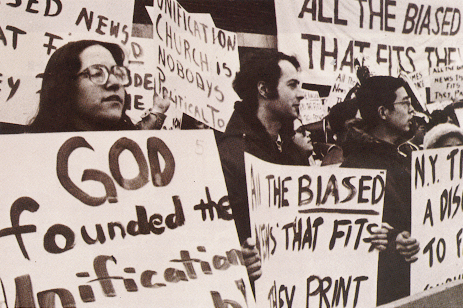 Members demonstrating outside during the hearing
