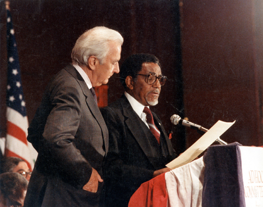 Reverend Joseph Lowery reading a public statement to the US president