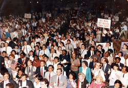 Reverend Moon's supporters hold a caldlelight match following his imprisonment