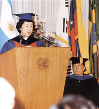 Mrs. Moon accepting an honorary doctorate from La Plata Catholic University on behalf of Reverend Moon