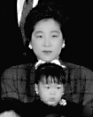 Un Jin Nim & child
